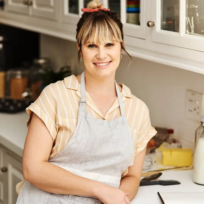 Home page 12 Bethany Delish recipe blogger standing in the kitchen