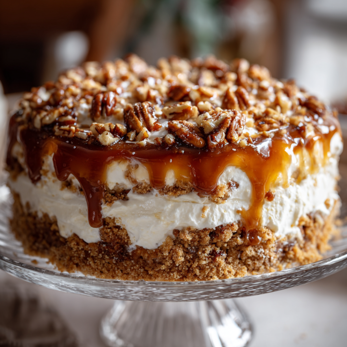 Decadent pecan pie lasagna topped with caramel and chopped pecans